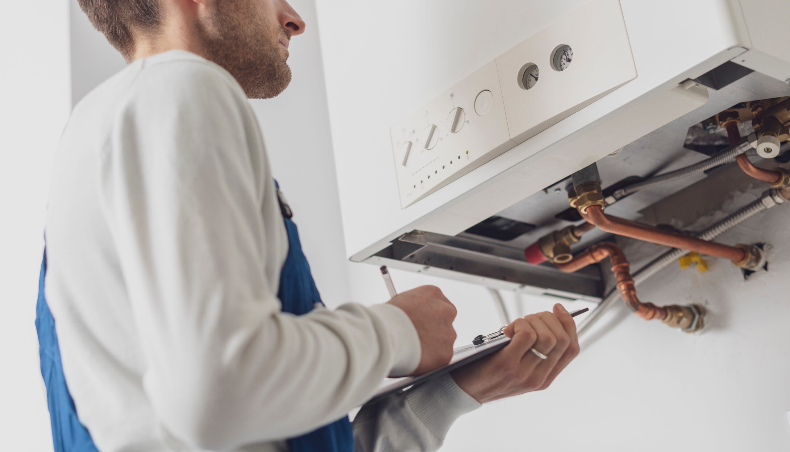 Placeholder — Tempco team installing a heat pump hot water system in the Southern Highlands