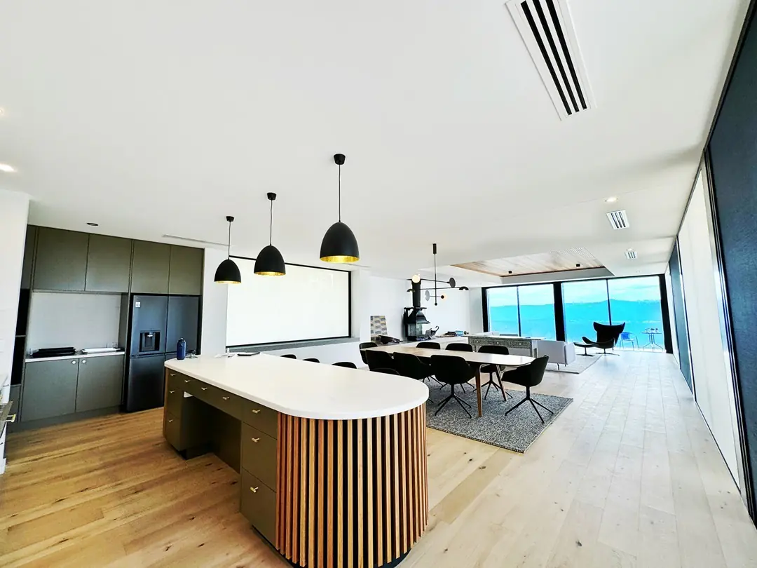Linear slot diffusers for ducted air conditioning in an open plan living room